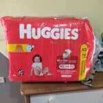 HUGGIES Fralda Supreme Care XG - 140 fraldas, Cor: Vermelho