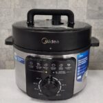 Panela De Pressão Mecânica Preta E Inox 4l Midea Cor Cinza