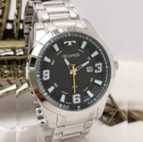 Relógio Masculino Dourado Technos Ouro 18k Carteira Brinde